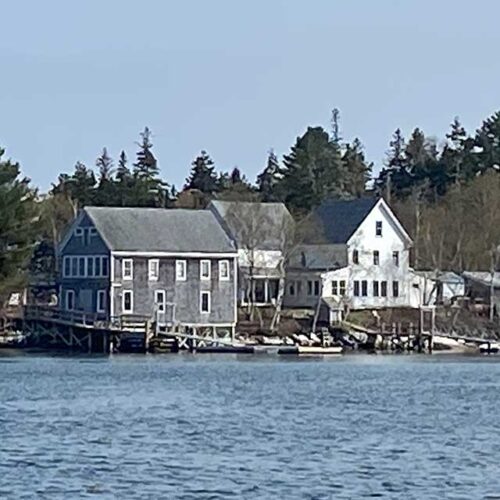 Weathered buildings on Hog Island in Maine