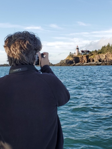 Maine artist Dominic White photographing West Quoddy lighthouse